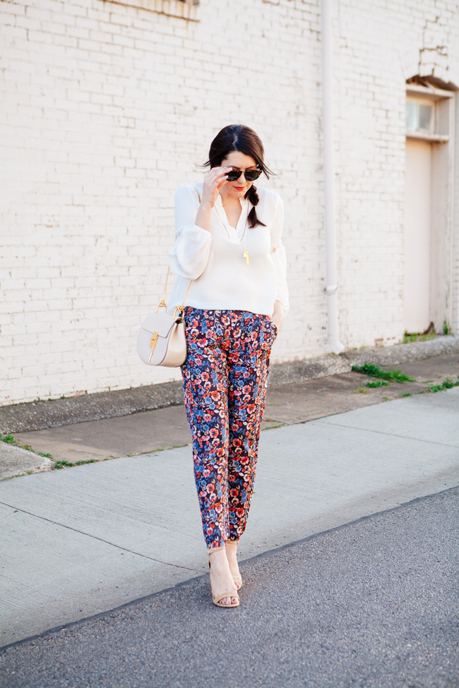 Parker blouse and Joie floral pants by style blogger Kendi Everyday.