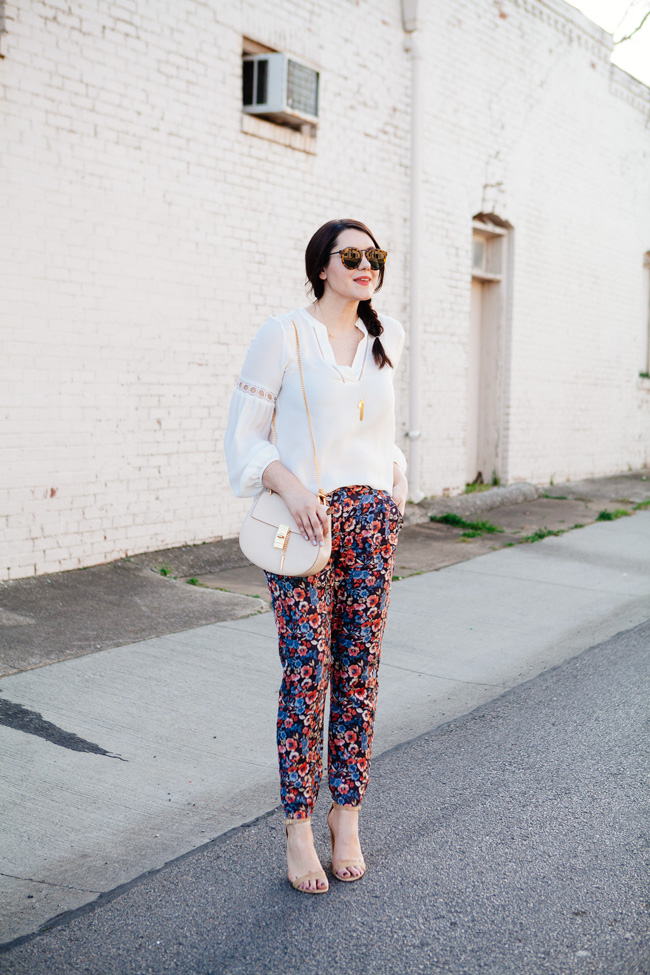 Parker blouse and Joie floral pants by style blogger Kendi Everyday.