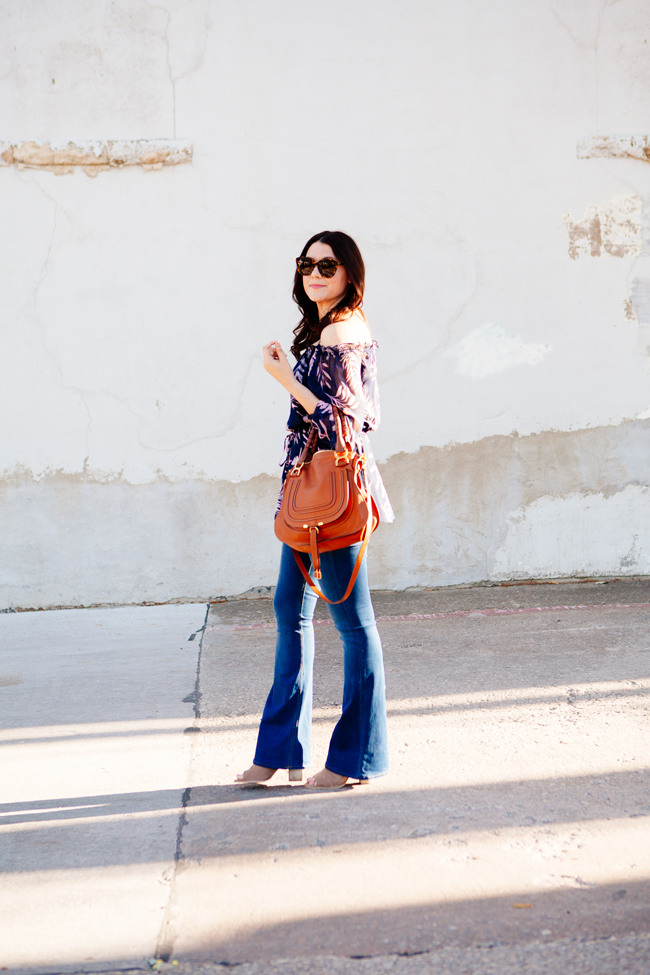 Off the shoulder blouse and flare jeans on Kendi Everyday