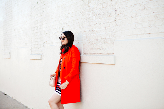 Red trench with striped pencil skirt by Kendi Everyday.