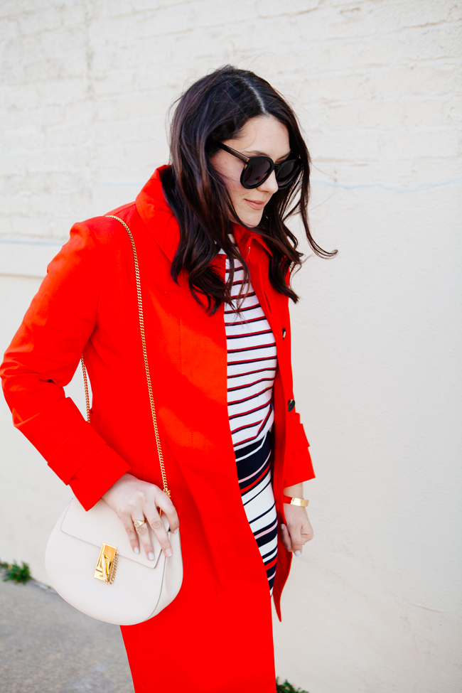 Red trench with striped pencil skirt by Kendi Everyday.