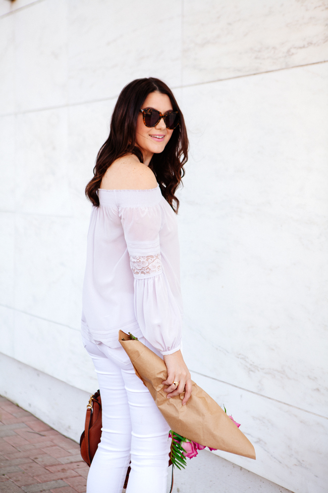 Off the shoulder top and white skinny jeans on Kendi Everyday