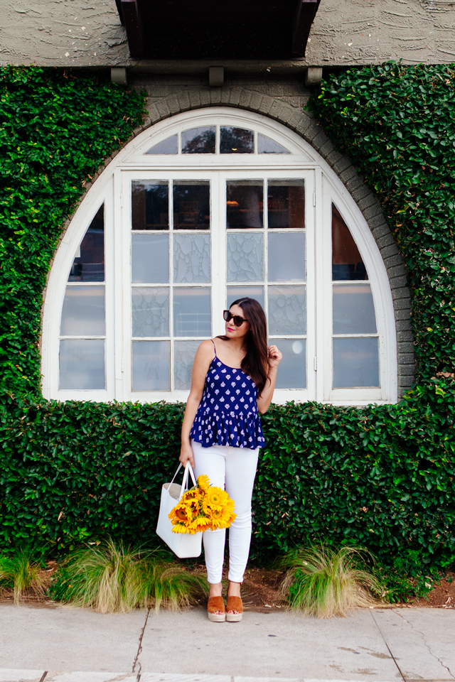 Navy printed peplum tank and white jeans on Kendi Everyday