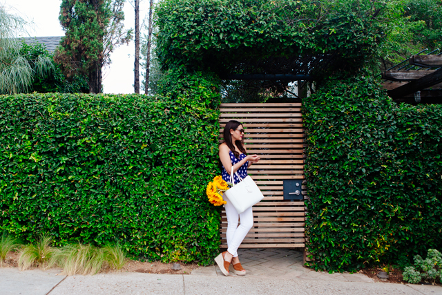 Navy printed peplum tank and white jeans on Kendi Everyday