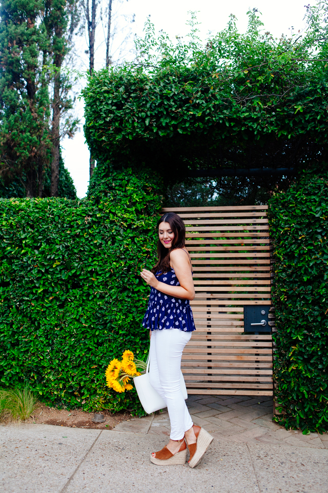 Navy printed peplum tank and white jeans on Kendi Everyday