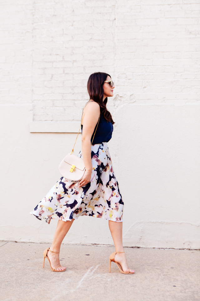 Floral skirt with navy camisole on Kendi Everyday.