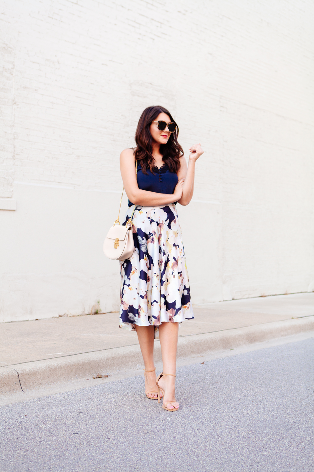 Floral skirt with navy camisole on Kendi Everyday.