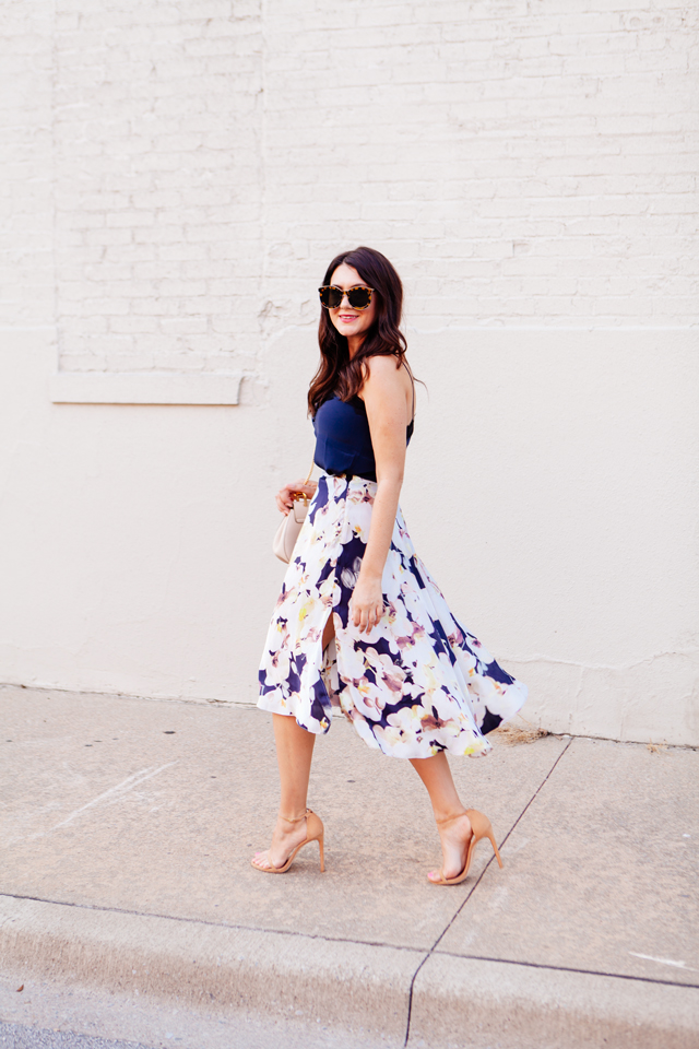 Floral skirt with navy camisole on Kendi Everyday.