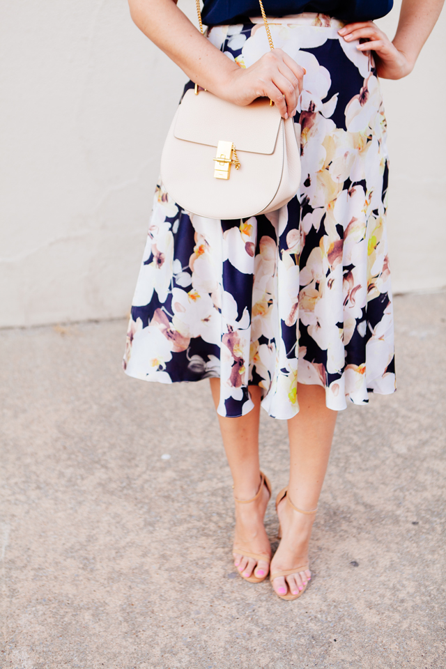 Floral skirt with navy camisole on Kendi Everyday.