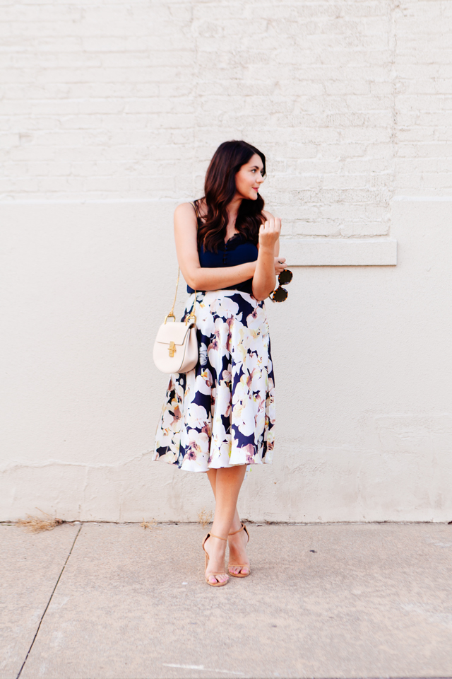 Floral skirt with navy camisole on Kendi Everyday.