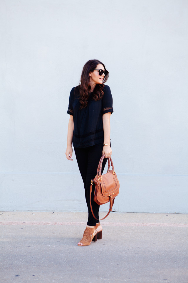 Black on black outfit with cognac accessories. 