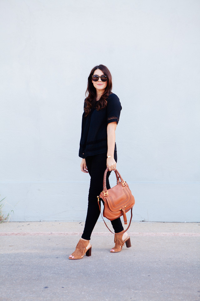 Black on black outfit with cognac accessories. 