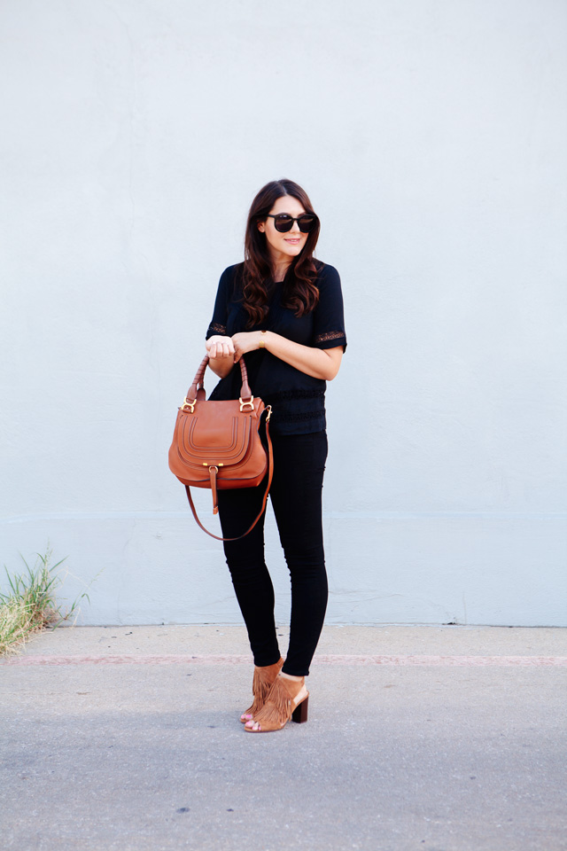 Black on black outfit with cognac accessories.