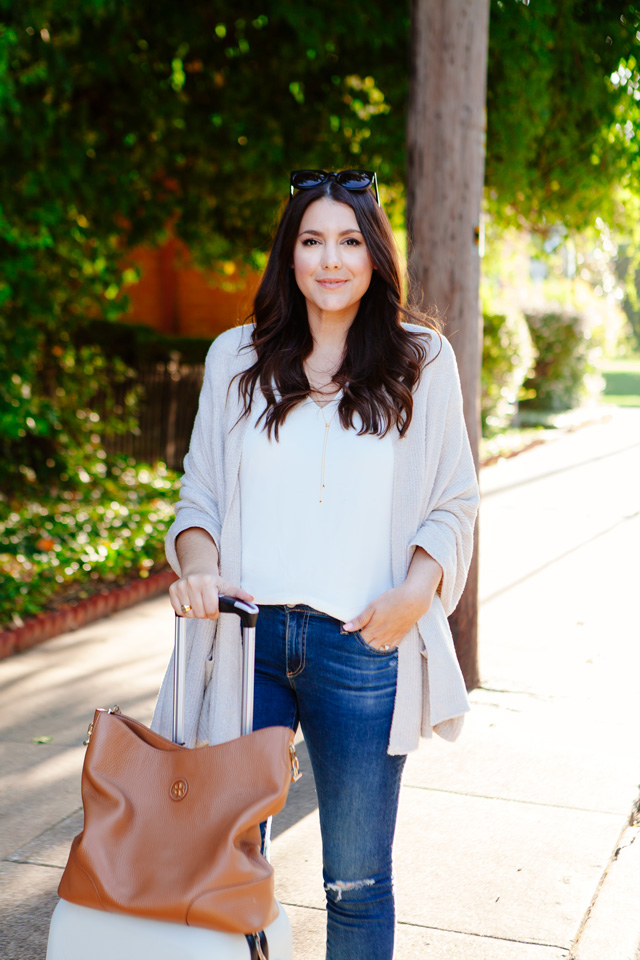Travel Sweater with distressed denim and nude flats on Kendi Everyday