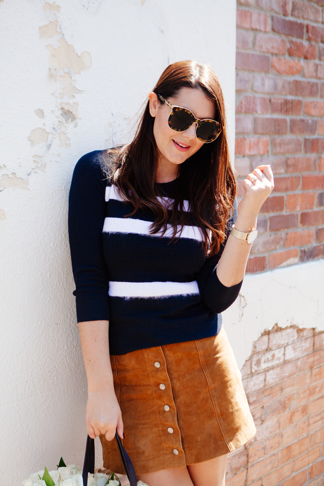 Striped sweater with suede mink skirt and tote with flowers on Kendi Everyday