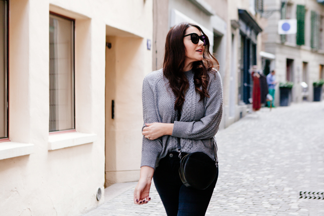 Grey cape and grey sweater on Kendi Everyday