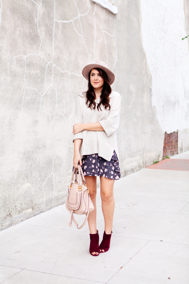 Floral mini skirt and oversized sweater from LOFT. 