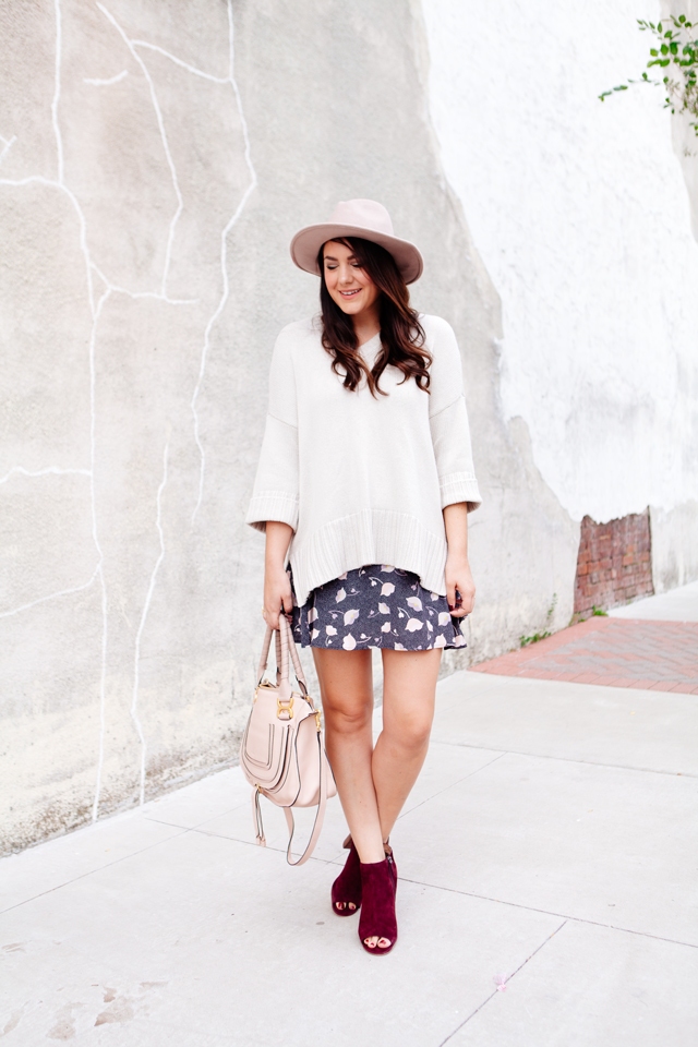 Floral mini skirt and oversized sweater from LOFT. 