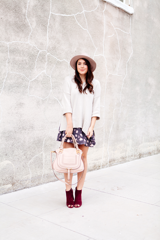 Floral mini skirt and oversized sweater from LOFT. 