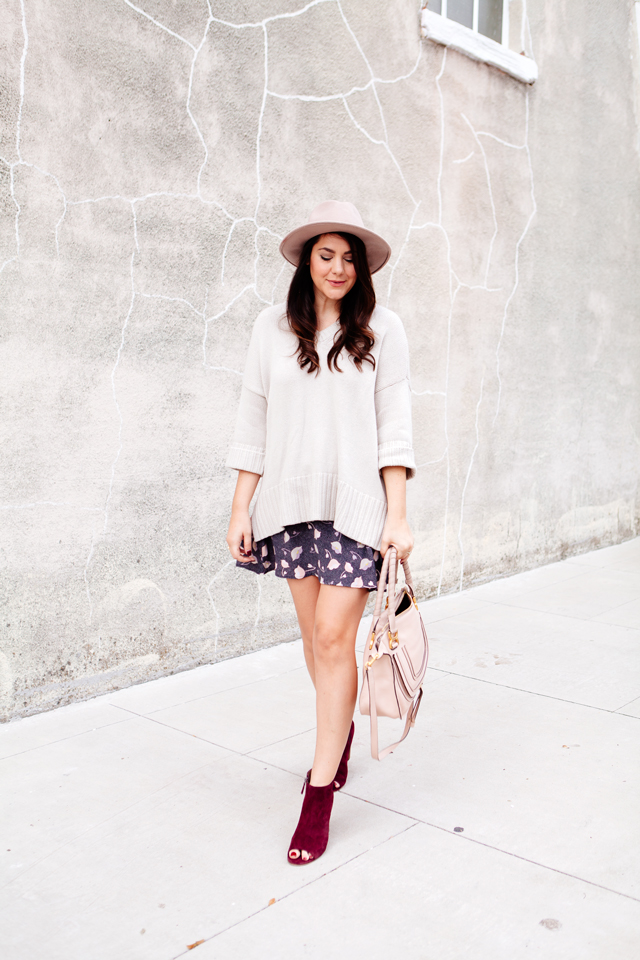 Floral mini skirt and oversized sweater from LOFT. 