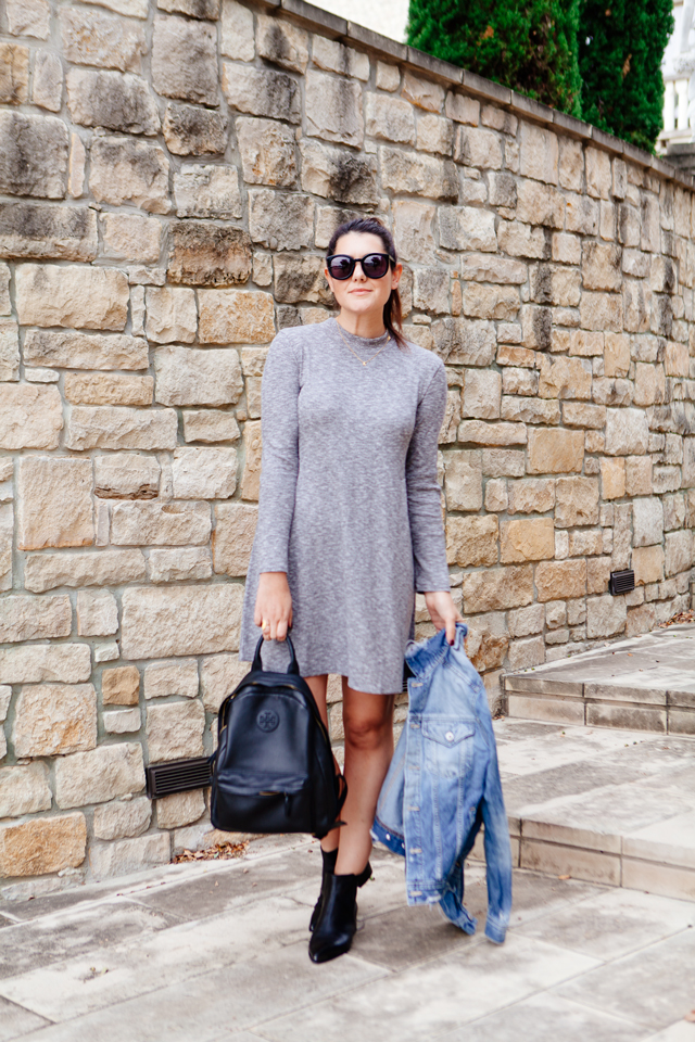 Knit Madewell dress with black chelsea boots and Tory Burch Leather Backpack.