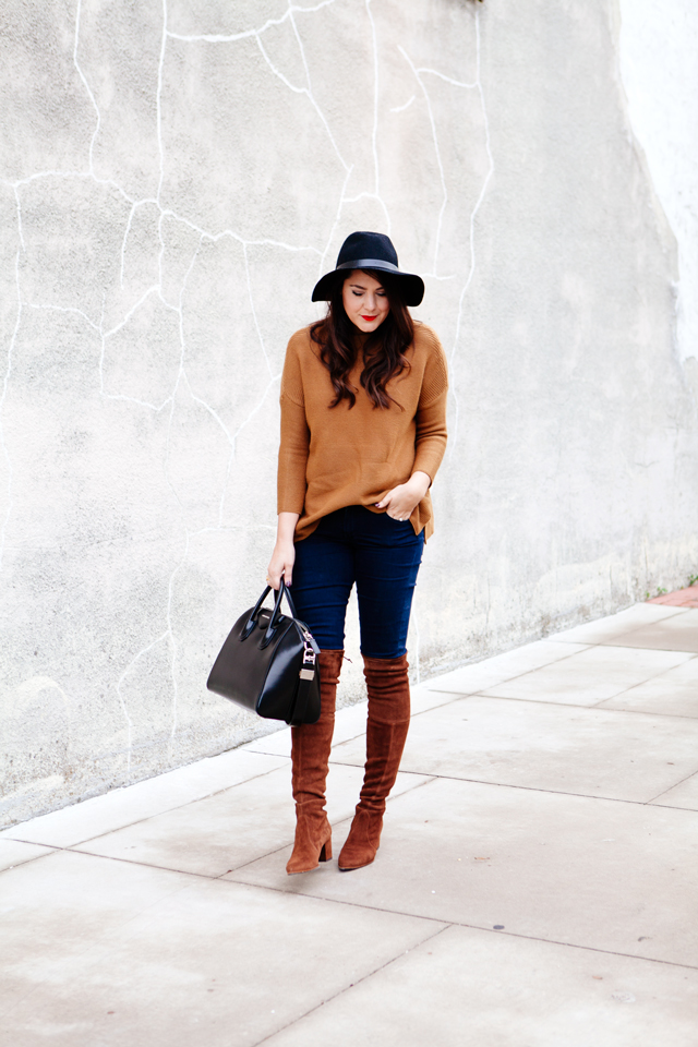 Camel sweater with over the knee Stuart Weitzman boots and black accessories on Kendi Everyday.