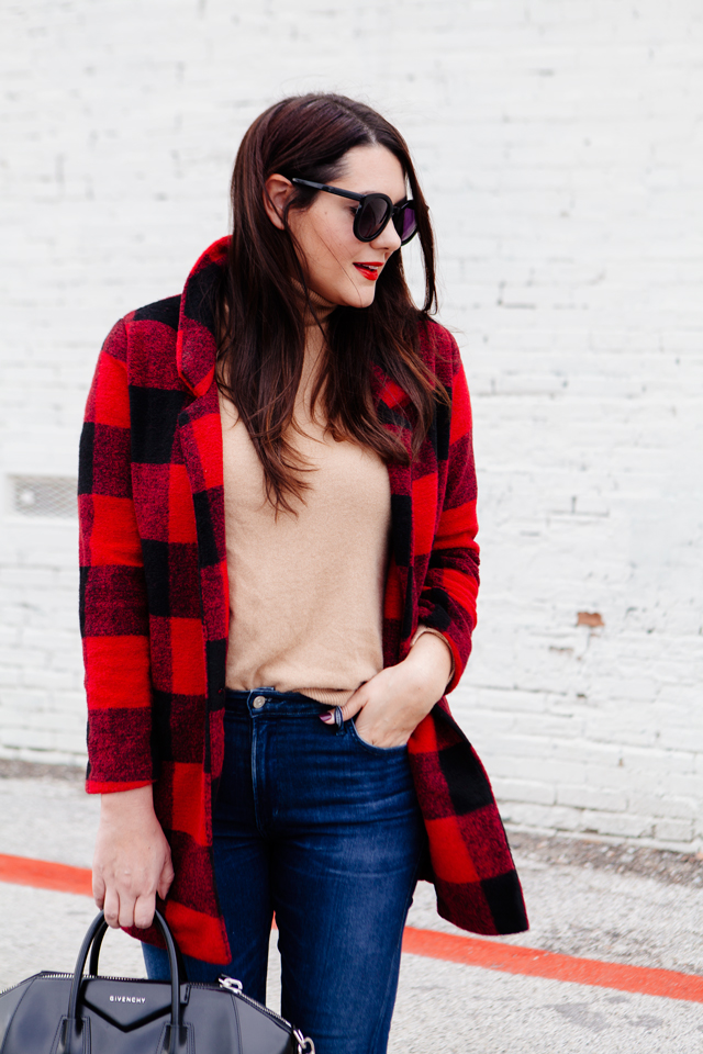 Buffalo plaid jacket with camel sweater and black heels on Kendi Everyday.