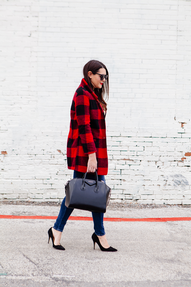 Buffalo plaid jacket with camel sweater and black heels on Kendi Everyday.