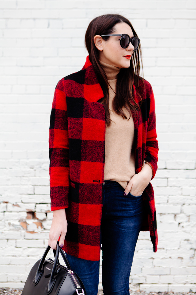 Buffalo plaid jacket with camel sweater and black heels on Kendi Everyday.