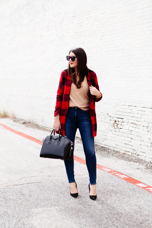 Buffalo plaid jacket with camel sweater and black heels on Kendi Everyday.