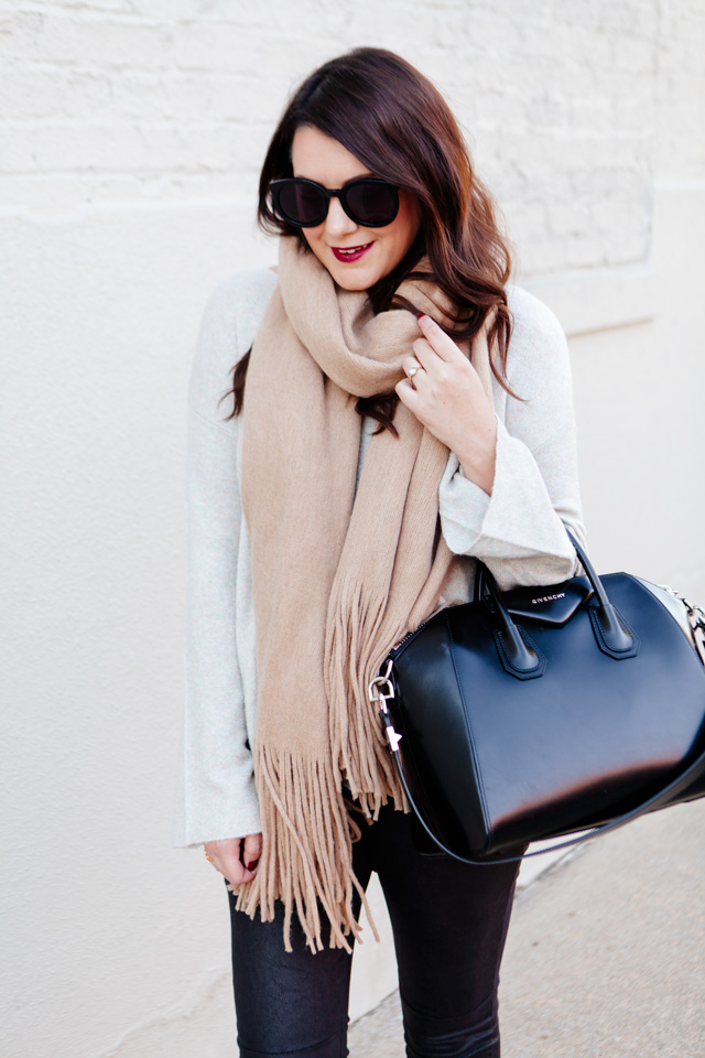 Oversized scarf with sweater and pom pom sneakers on Kendi Everyday.