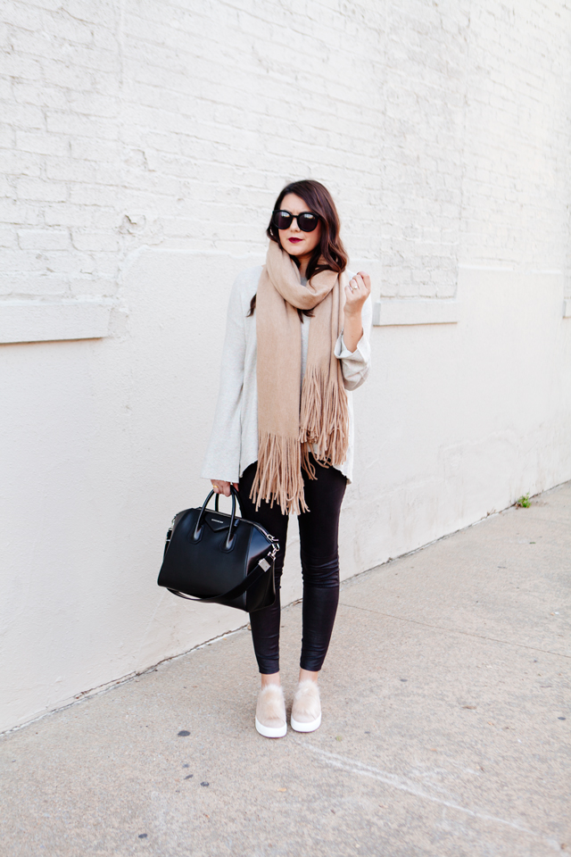 Oversized scarf with sweater and pom pom sneakers on Kendi Everyday.