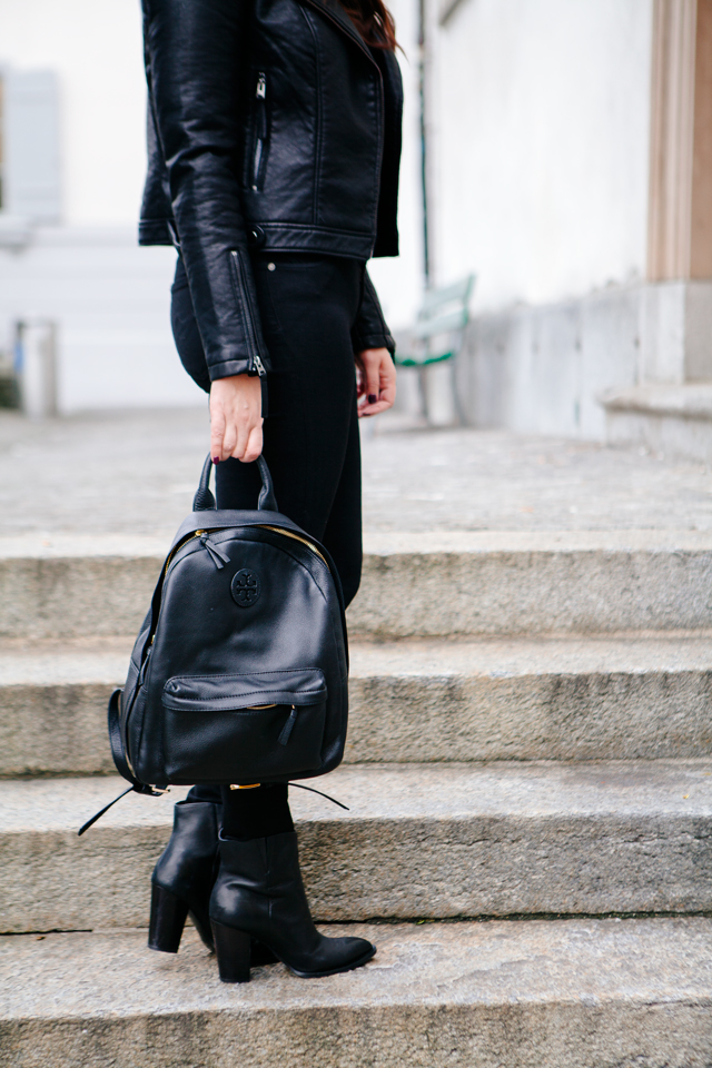 Black moto jacket with fur collar and black denim on Kendi Everyday