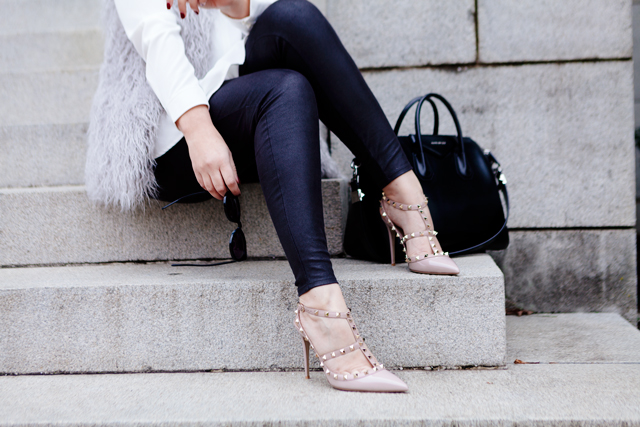 Grey faux fur vest and black neutral outfit