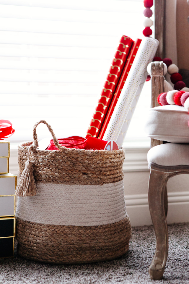 Basket with wrapping paper stored in it.