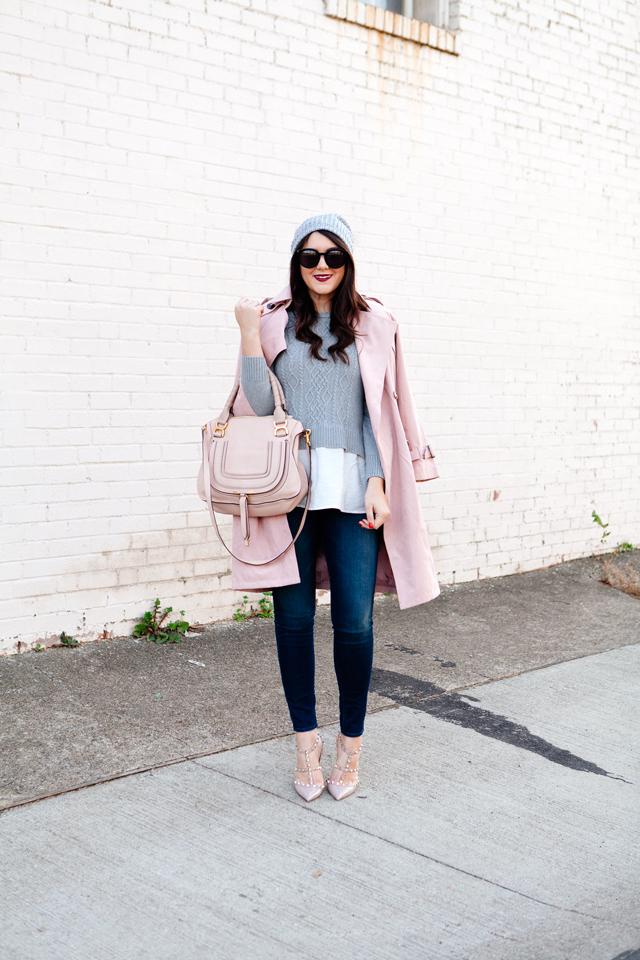 Light pink trench and layered sweater on Kendi Everyday.