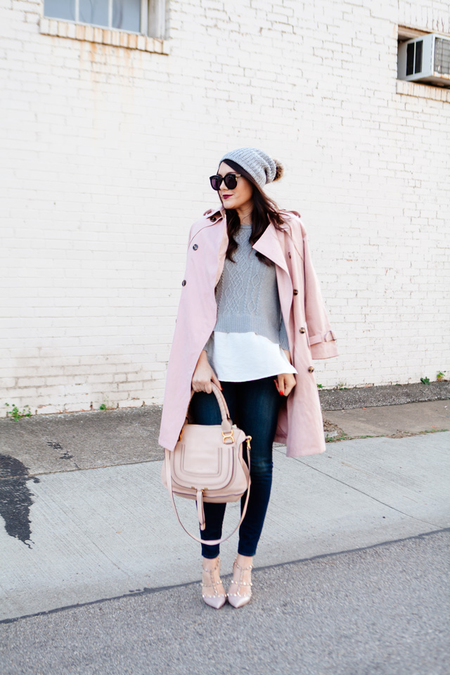 Light pink trench and layered sweater on Kendi Everyday.