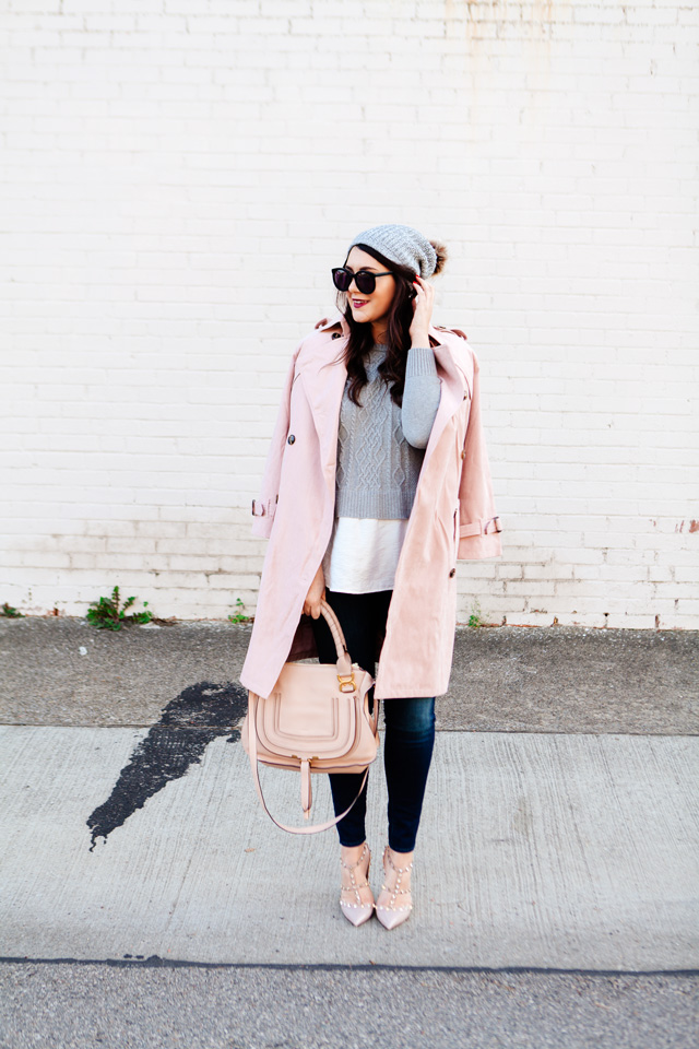 Light pink trench and layered sweater on Kendi Everyday.