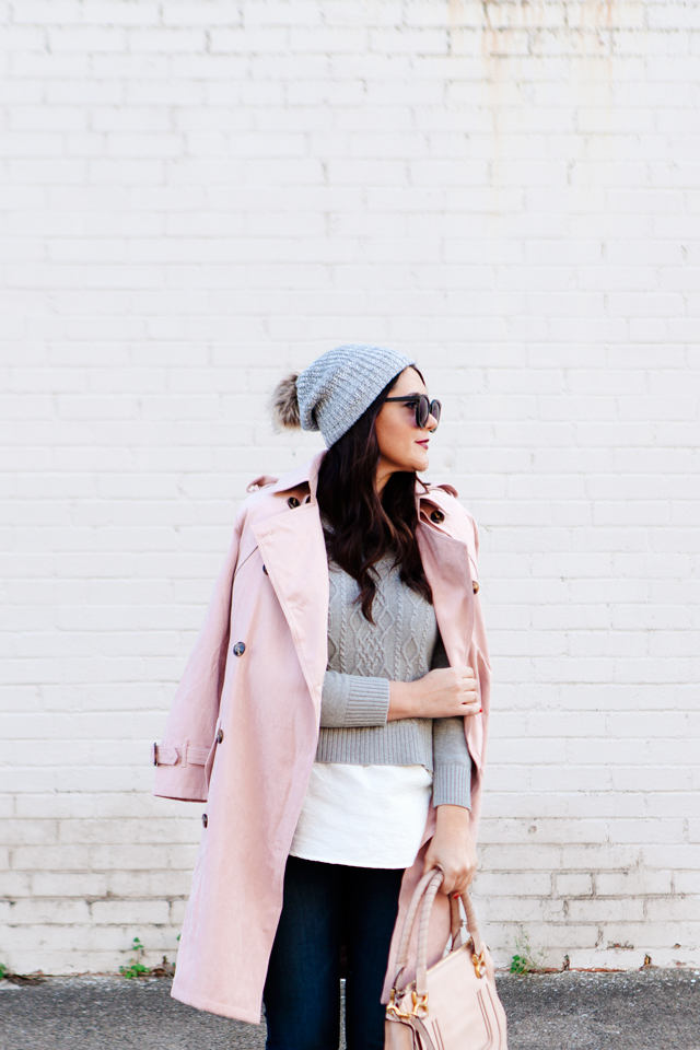 Light pink trench and layered sweater on Kendi Everyday.