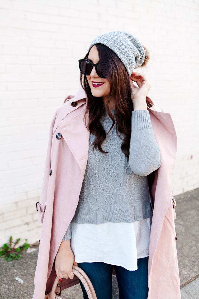 Light pink trench and layered sweater on Kendi Everyday.