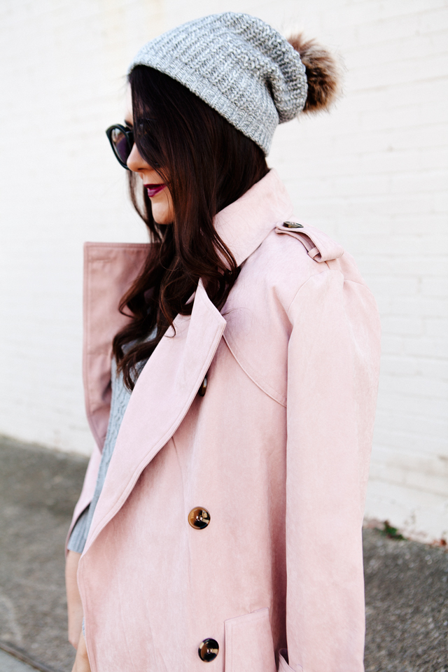 Light pink trench and layered sweater on Kendi Everyday.