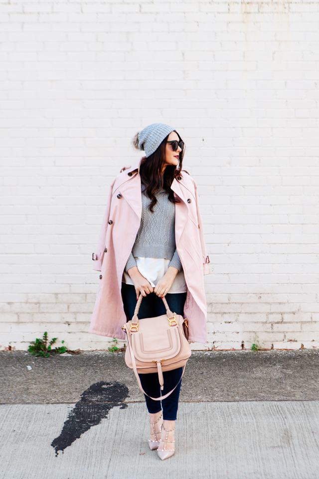 Light pink trench and layered sweater on Kendi Everyday.