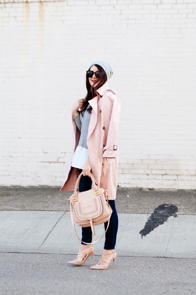 Light pink trench and layered sweater on Kendi Everyday.