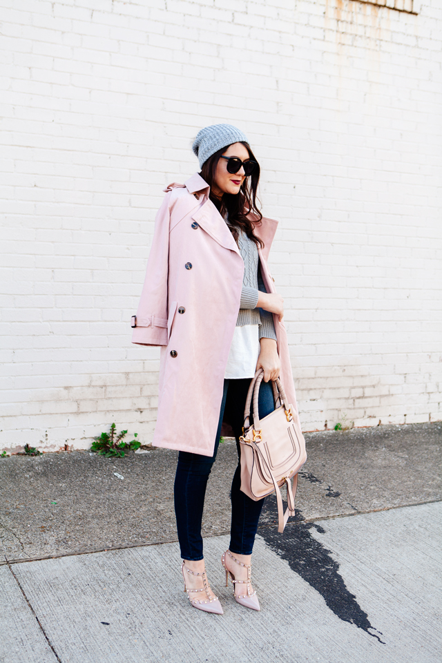 Light pink trench and layered sweater on Kendi Everyday.