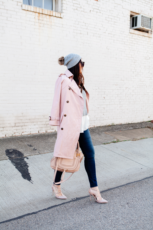 Light pink trench and layered sweater on Kendi Everyday.