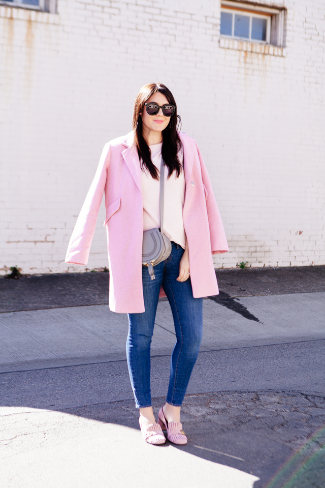 Pink Asos coat over pink sweater and denim on Kendi Everyday