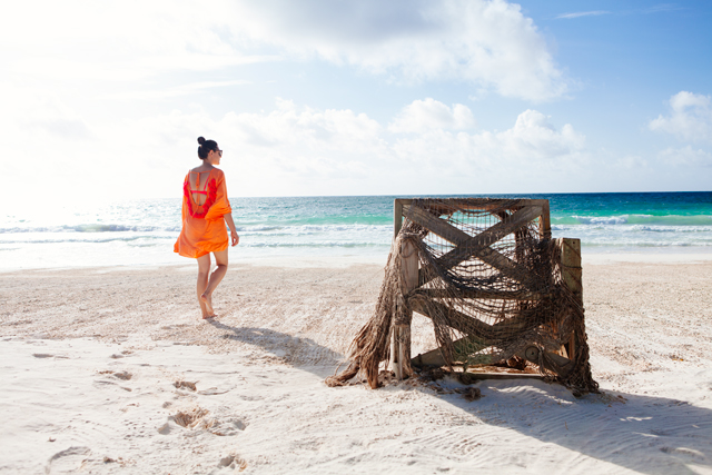 Orange and pink beach coverup in Tulum