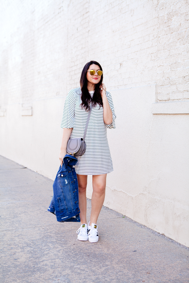 black and white striped dress with denim jacket and adidas superstars