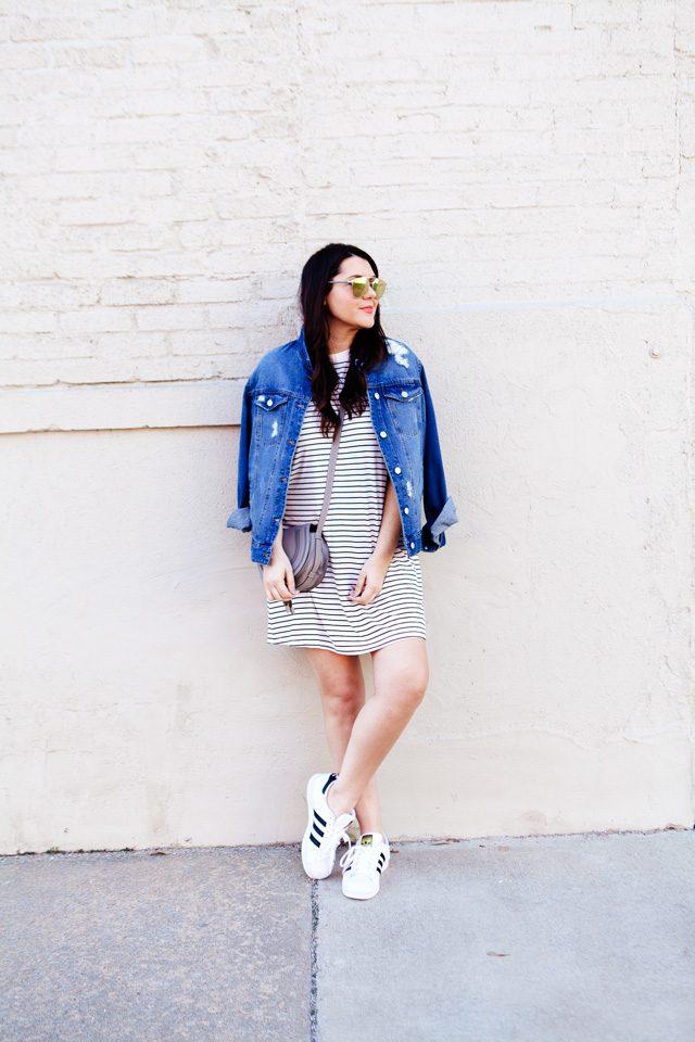 black and white striped dress with denim jacket and adidas superstars
