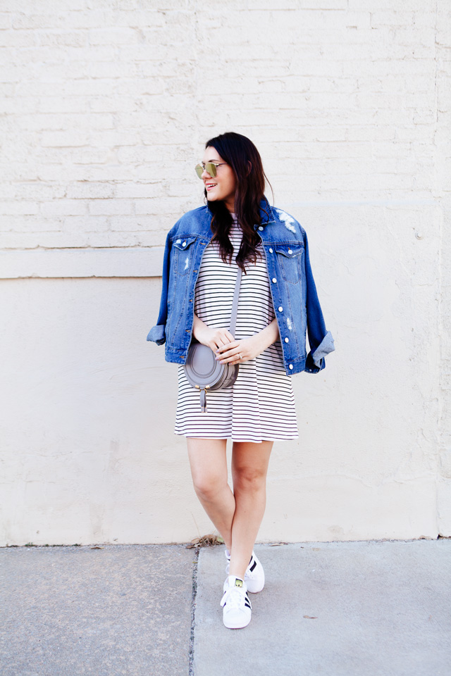 black and white striped dress with denim jacket and adidas superstars